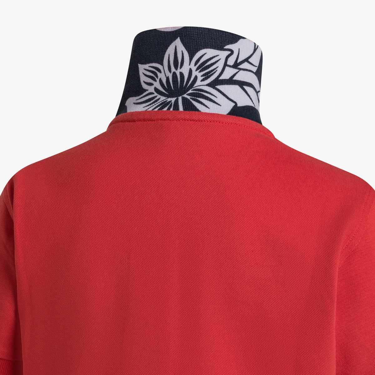 Polo rossa con stampa floreale