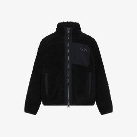 Giacca in teddy con dettagli in nylon nero